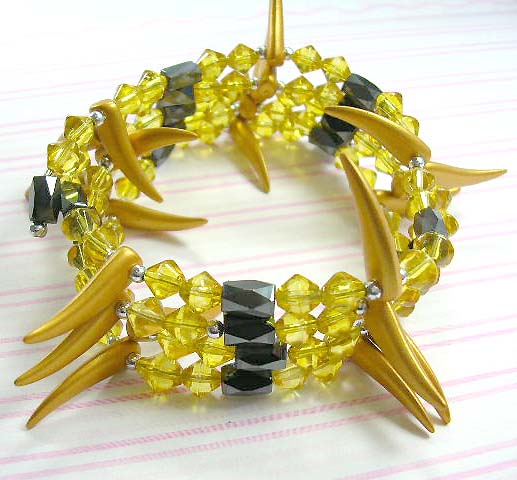 Holiday shopping hematite jewelry at wholesale price, magnetic hematite wrap with yellow rhinestone and imitation shark teeth